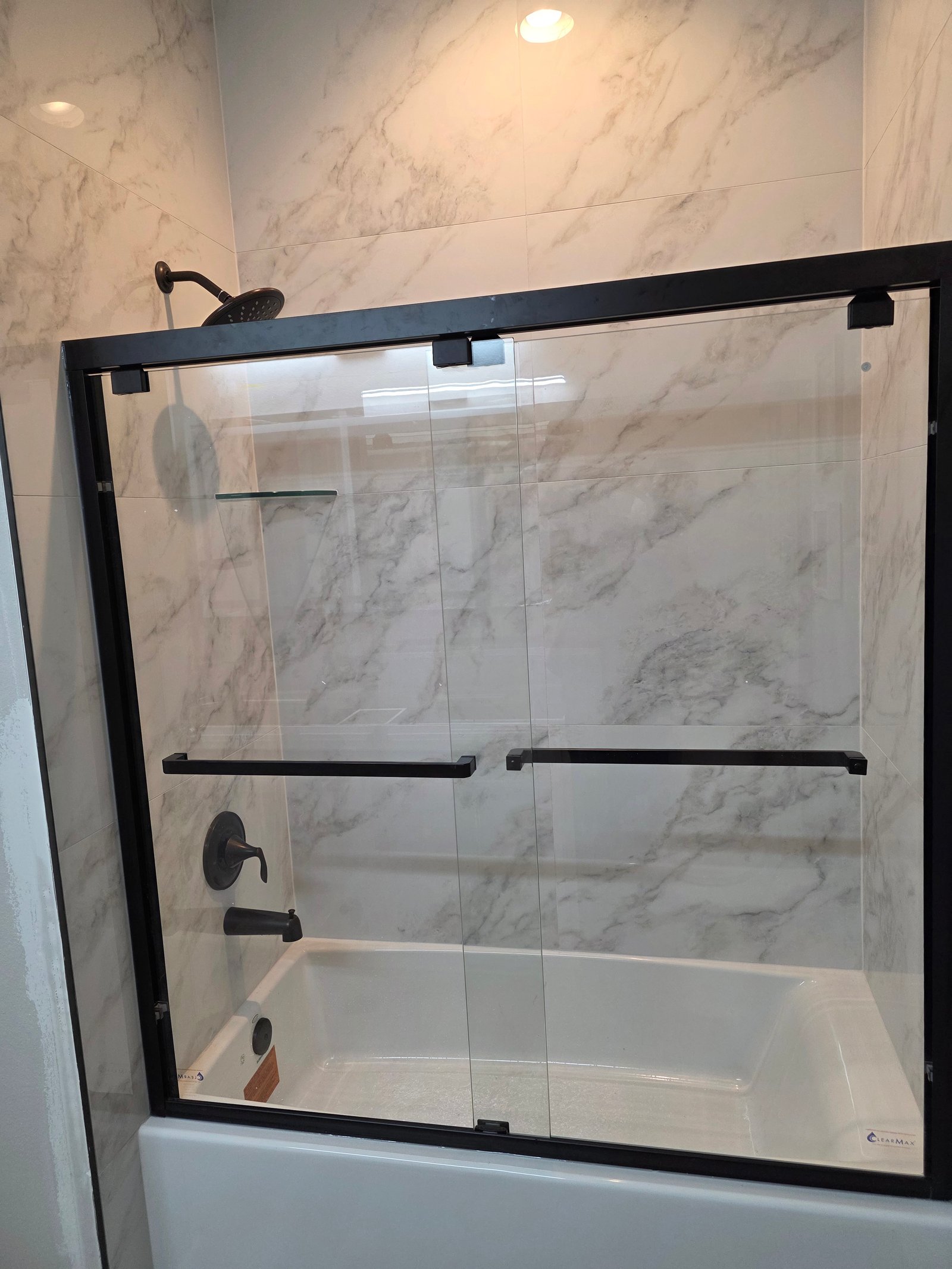 Glass bathtub enclosure installation